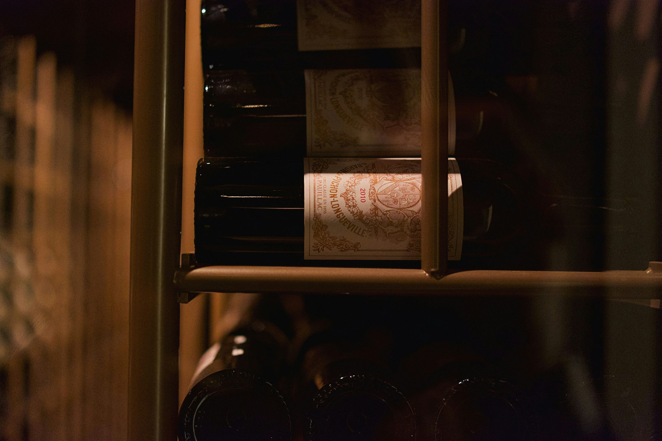 wine-on-the-shelve bottles of wine on the shelf